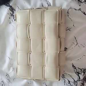 Studio 94 (brand no longer available) cream braided crossbody bag.